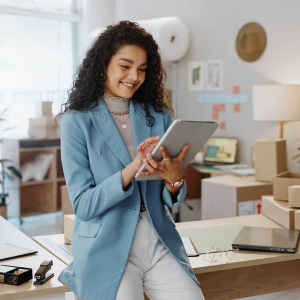 businesswoman on tablet at work