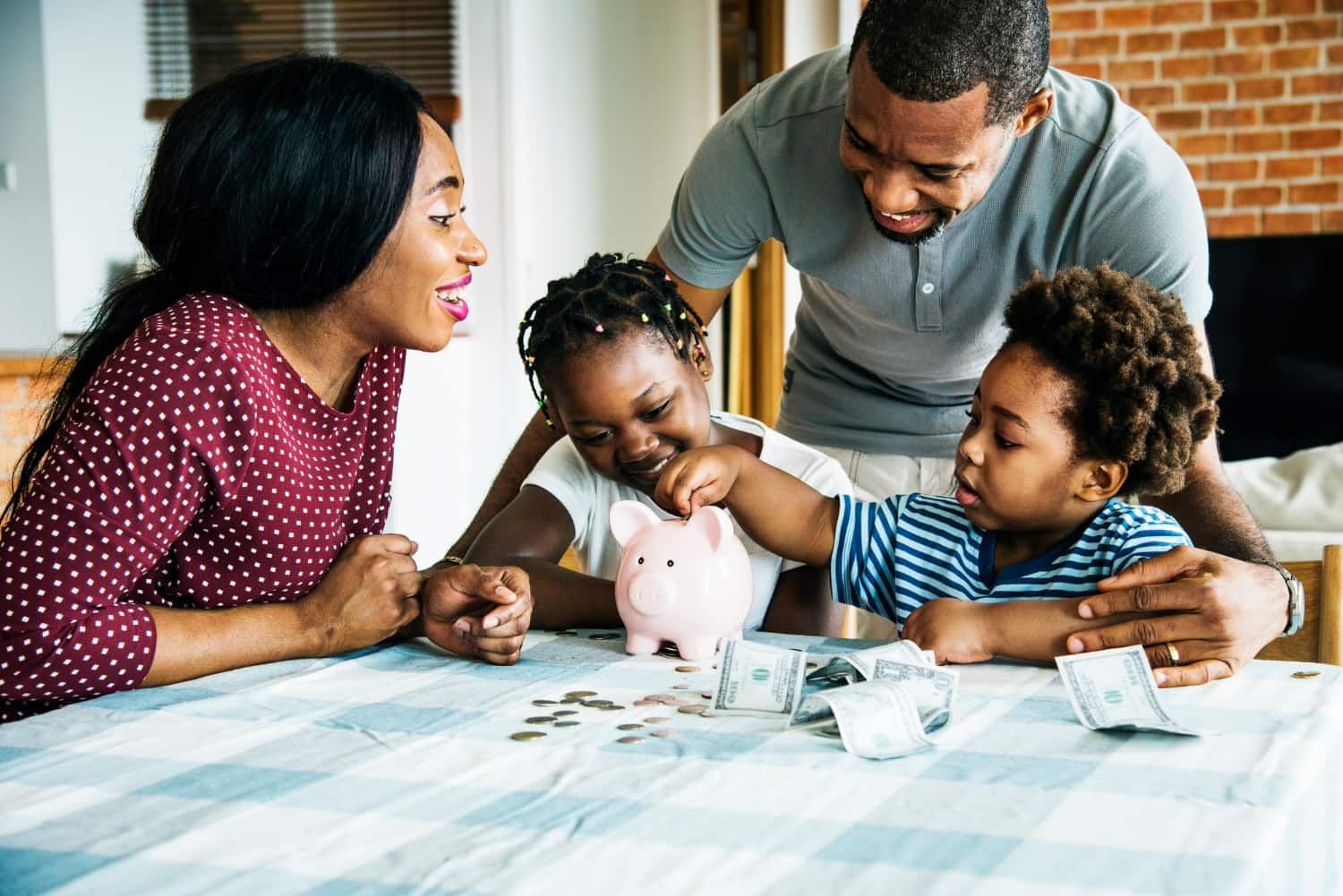 family counting coins saving money